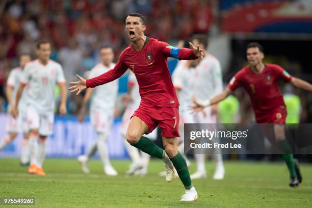 Cristiano Ronaldo of Portugal celebrates scoring a goal to make it 3-3 during the 2018 FIFA World Cup Russia group B match between Portugal and Spain...