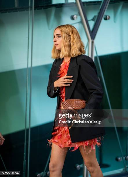 Candela Novembre wearing blazer jacket, red dress is seen outside Alberta Ferretti during Milan Men's Fashion Week Spring/Summer 2019 on June 15,...