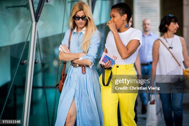 Ada Kokosar and Tamu McPherson seen outside Alberta Ferretti during Milan Men's Fashion Week Spring/Summer 2019 on June 15, 2018 in Milan, Italy.