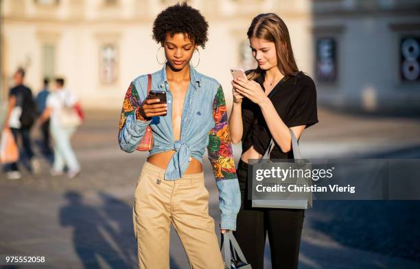 Model wearing jeans shirt, Chanel bag, beige pants is seen outside Alberta Ferretti during Milan Men's Fashion Week Spring/Summer 2019 on June 15,...