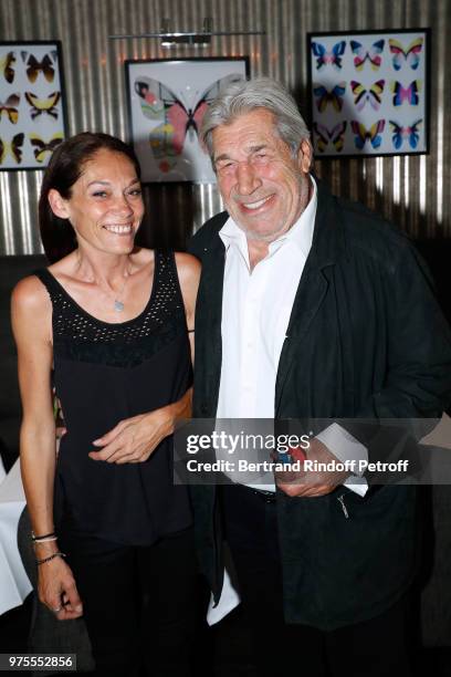 Charlotte Joly and actor Jean-Pierre Castaldi attend the "Street Art butterflies" by Charlotte Joly Exhibition Preview at Veramente, on June 15, 2018...