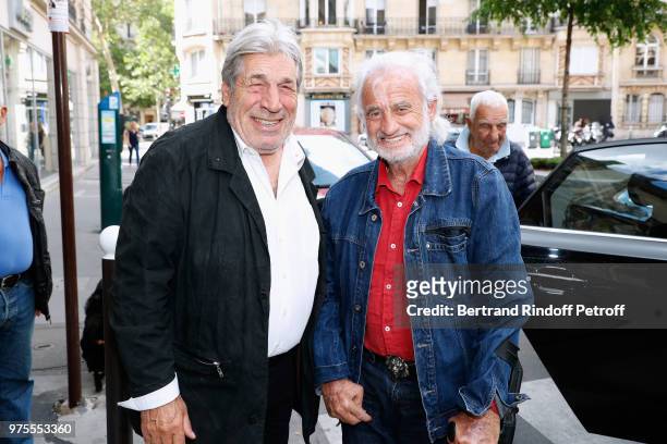 Actors Jean-Pierre Castaldi and Jean-Paul Belmondo attend the "Street Art butterflies" by Charlotte Joly Exhibition Preview at Veramente, on June 15,...