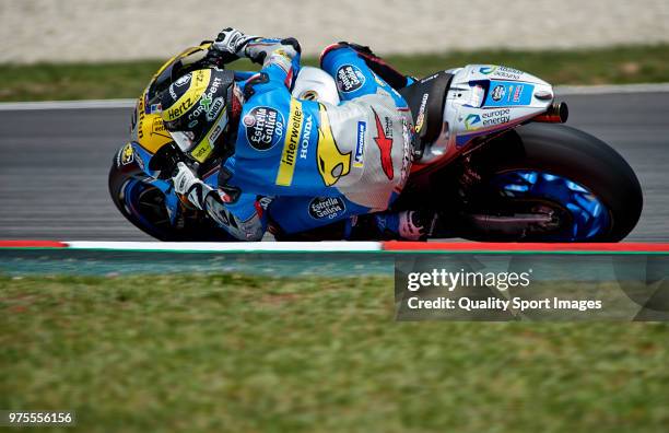 Thomas Luthi of Switzerland and Team EG 0,0 Marc VDS rounds the bend during free practice for the MotoGP of Catalunya at Circuit de Catalunya on June...