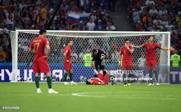 June 2018, Russia, Sochi: Soccer, FIFA World Cup, Group B: Portugal vs Spain at the Sochi stadium. Portugal's Goncalo Guedes , keeper Rui Patricio,...