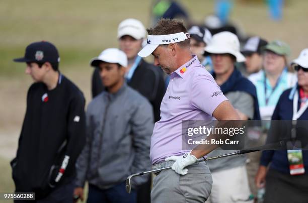 Ian Poulter of England reacts after chipping to the eighth hole for the second time during the second round of the 2018 U.S. Open at Shinnecock Hills...