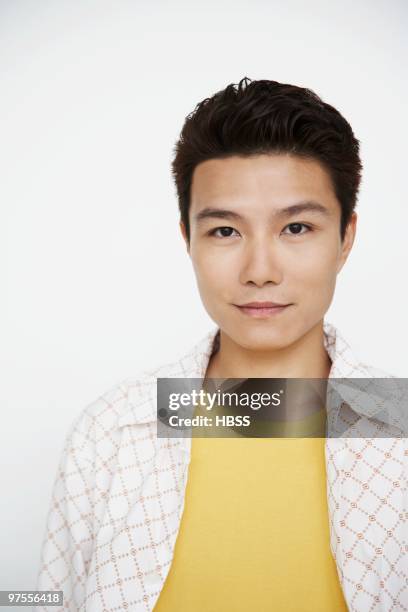 young man looking at camera - androgynous stock pictures, royalty-free photos & images