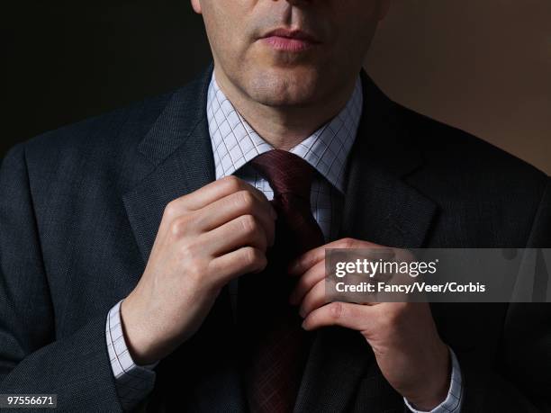 Adjusting Adjusting Collar Photos and Premium High Res Pictures - Getty Images