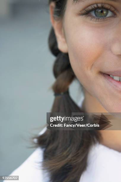 schoolgirl smiling - children only braided ponytail stock pictures, royalty-free photos & images