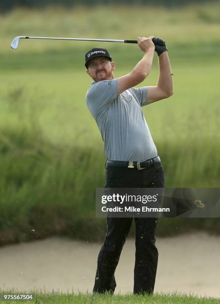 Jimmy Walker of the United States plays a shot on the ninth hole during the second round of the 2018 U.S. Open at Shinnecock Hills Golf Club on June...