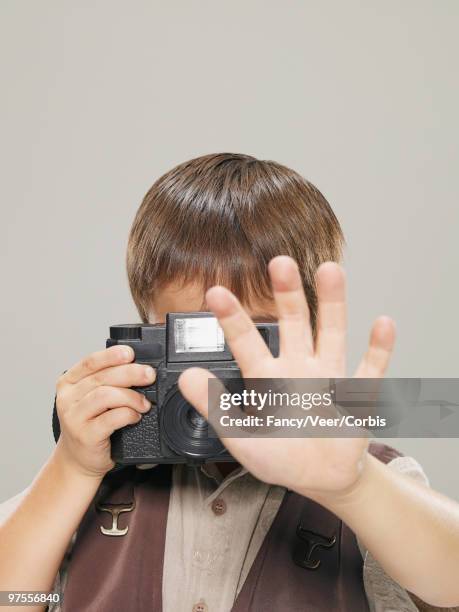 boy taking pictures - offbeat documentation foto e immagini stock