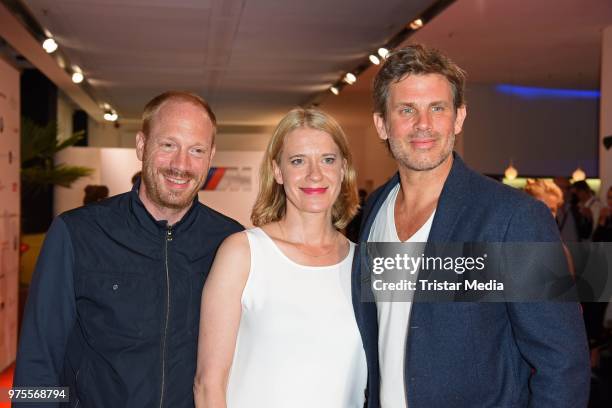 Johann von Buelow, Caroline Peters and Steffen Groth attend the cocktail party during the semi-final round of judging of the International Emmy...