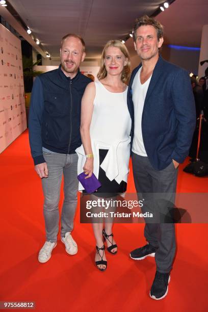 Johann von Buelow, Caroline Peters and Steffen Groth attend the cocktail party during the semi-final round of judging of the International Emmy...