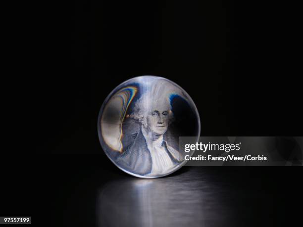 us currency and crystal ball - crystal ball stock-fotos und bilder