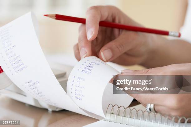 Woman Using A Adding Machine Rolling Machine Photos and Premium High Res Pictures - Getty Images