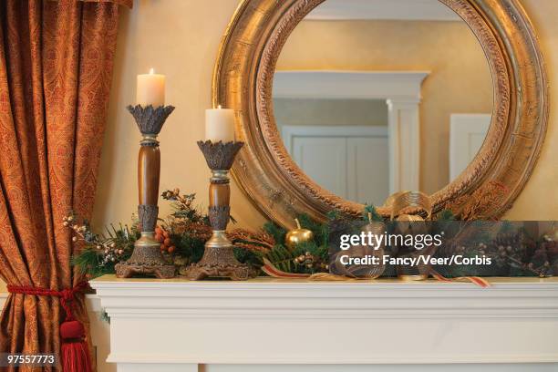 festively decorated fireplace mantel - photo frame on mantle piece stock pictures, royalty-free photos & images