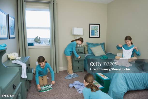girl cleaning bedroom - multiple images of the same person stock pictures, royalty-free photos & images
