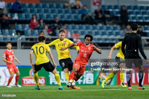 Jeju FC Forward Magno Cruz fights for the ball with Guangzhou Midfielder Nemanja Gudelj during the AFC Champions League 2018 Group Stage G Match Day...