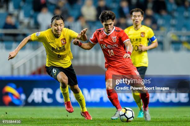 Jeju FC Midfielder Lee Chang-Min fights for the ball with Guangzhou Defender Zhang Linpeng during the AFC Champions League 2018 Group Stage G Match...