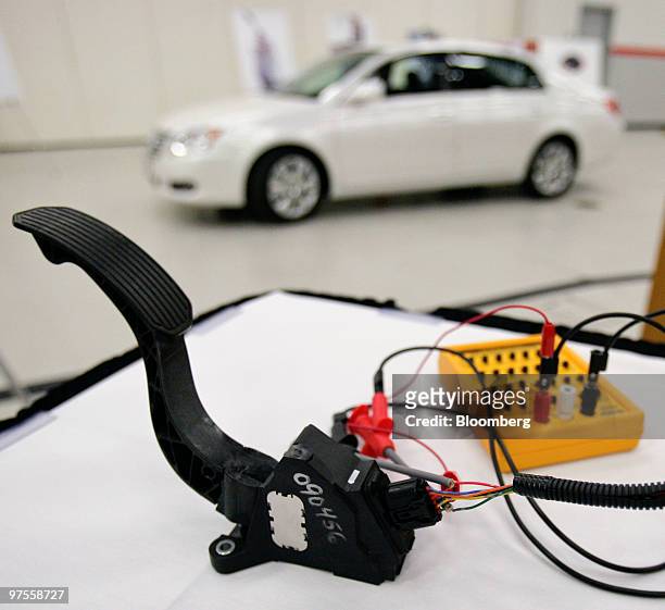 An accelerator pedal from a Toyota Motor Corp. Vehicle is tested during a news conference at Toyota's U.S. Sales headquarters in Torrance,...
