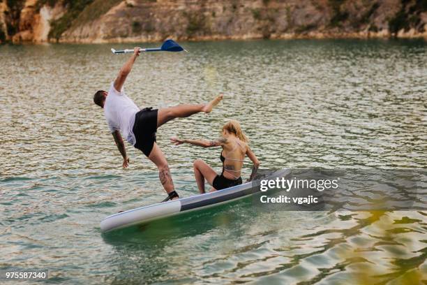 paddleboarding - paddle surf foto e immagini stock