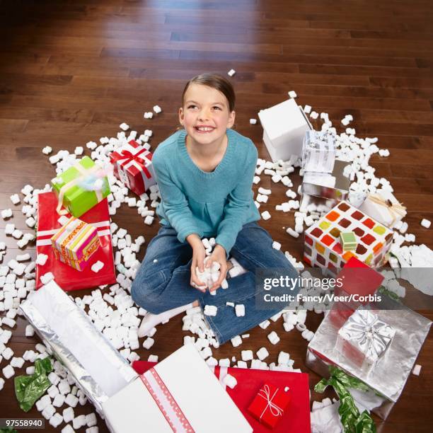 girl surrounded by gifts - xmas eps stockfoto's en -beelden