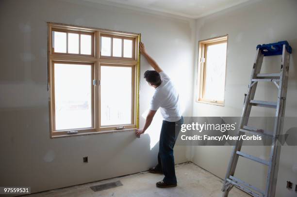 Man Replacing Window Photos and Premium High Res Pictures - Getty Images