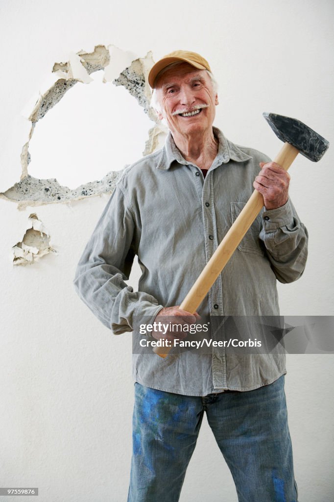 Man holding sledgehammer