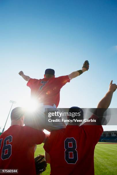 baseball players celebrating - baseball team celebration stock pictures, royalty-free photos & images