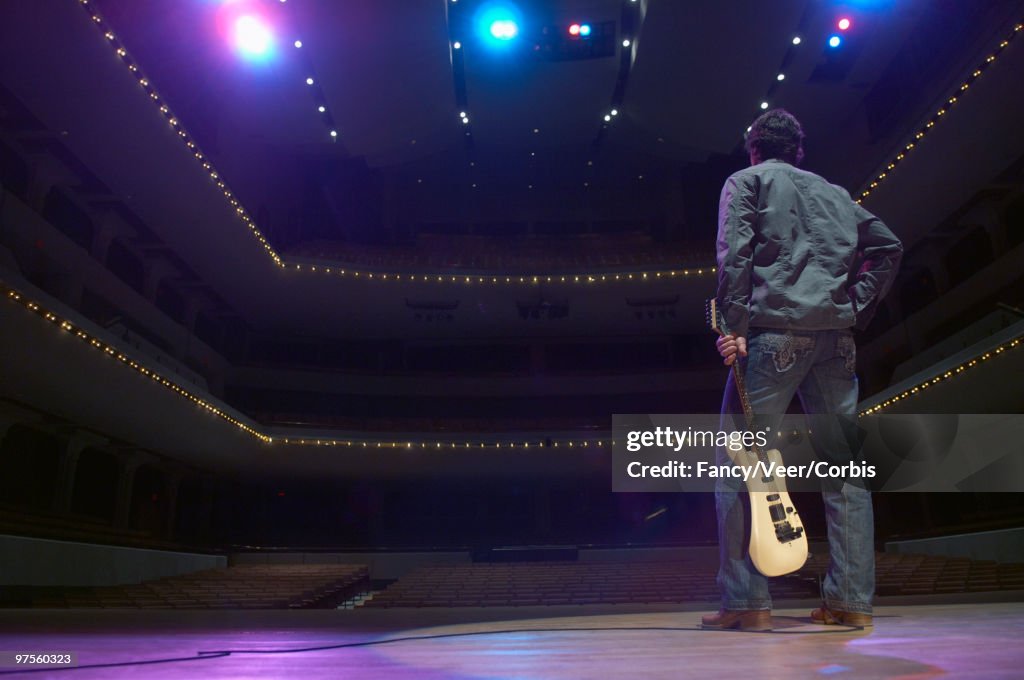 Rock star in an empty theater