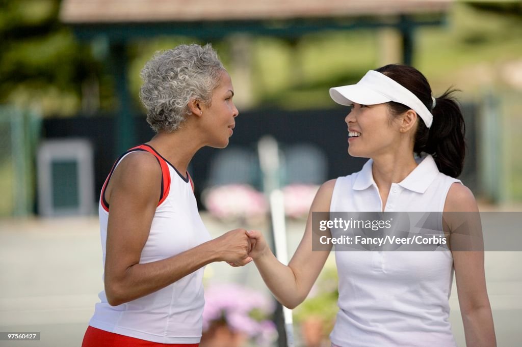Tennis players shaking hands
