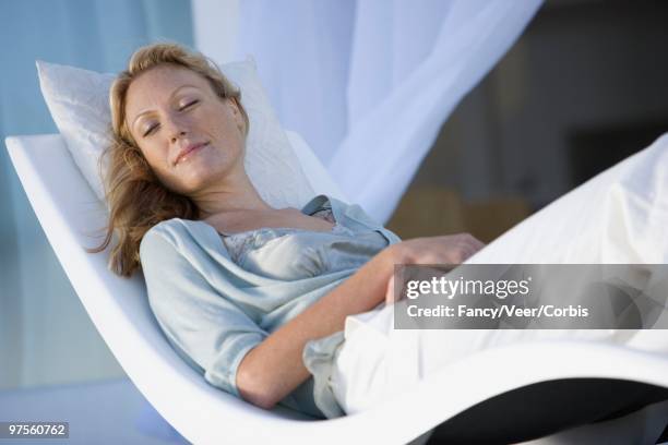 woman napping - beautiful woman sleeping stock pictures, royalty-free photos & images