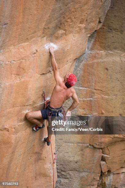 rock climber - 胴上げ ストックフォトと画像