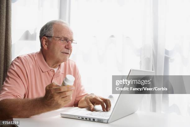 Man Carrying Laptop Kitchen Photos and Premium High Res Pictures ...