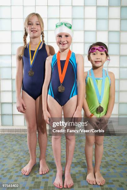 swim team with medals - kids swim caps stock pictures, royalty-free photos & images