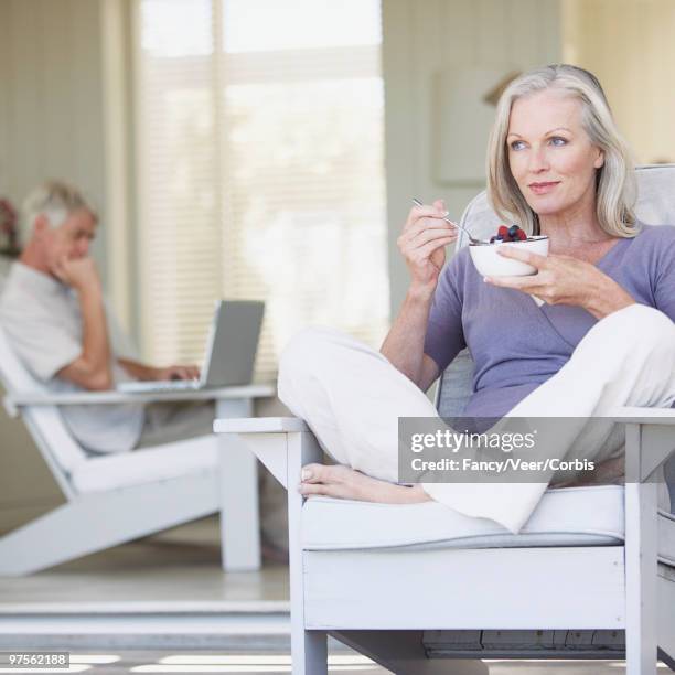 couple relaxing at home - long term care stock pictures, royalty-free photos & images