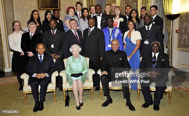 Queen Elizabeth II sits for a group portrait with Commonwealth Secretary General Kamalesh Sharma , Commonwealth Parlimentarians and guests at the...