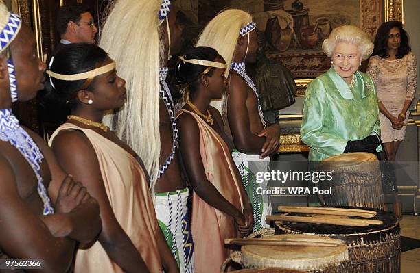 Queen Elizabeth II meets musicians at the Commonwealth Day Reception at Marlborough House on March 08, 2010 in London, England.