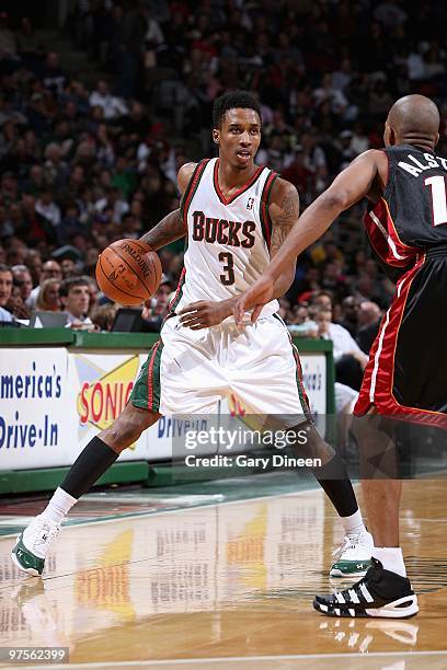 Brandon Jennings of the Milwaukee Bucks handles the ball against Rafer Alston of the Miami Heat during the game on January 30, 2010 at the Bradley...