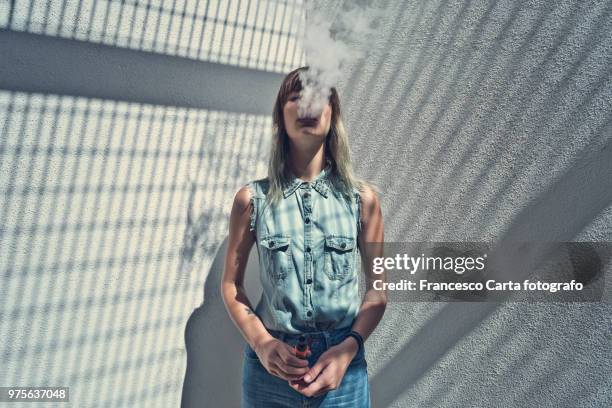 vapor smoke - vaping danger stock pictures, royalty-free photos & images