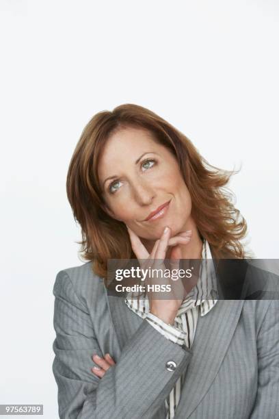 woman deliberating - un certain regard stock pictures, royalty-free photos & images