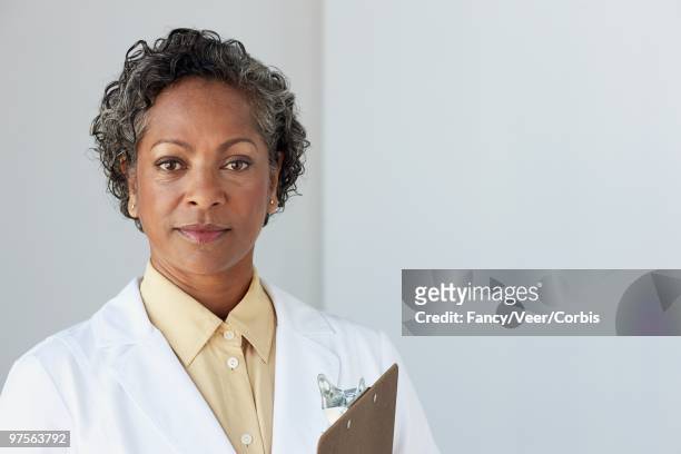 female doctor - collar stock pictures, royalty-free photos & images
