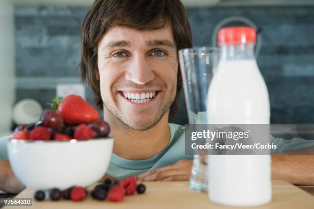 man with a healthy breakfast - young urban professional person stock-fotos und bilder