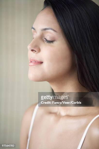 satisfied woman with eyes closed - super sensory stock-fotos und bilder