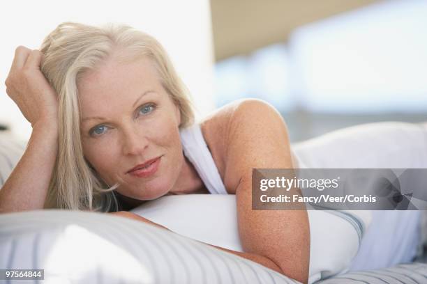 woman relaxing - sleeveless top stock pictures, royalty-free photos & images