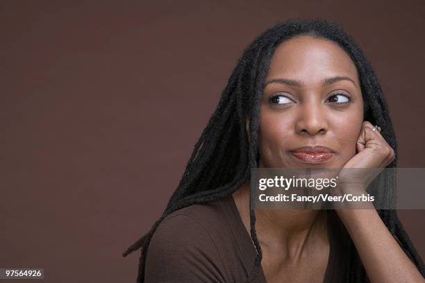 woman looking sideways - smiling mature eyes stockfoto's en -beelden