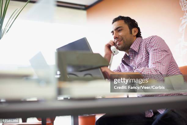businessman at his desk - super sensory stock-fotos und bilder