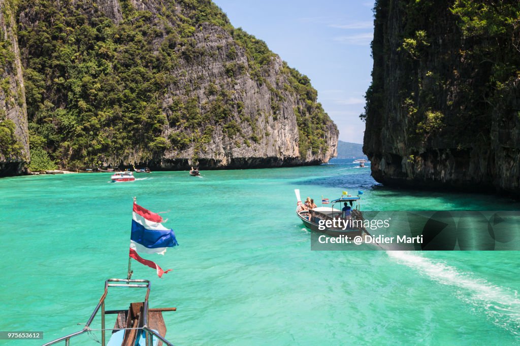 Long tail boat around the stunning Ko Phi Phi island in Krabi province in south Thailand