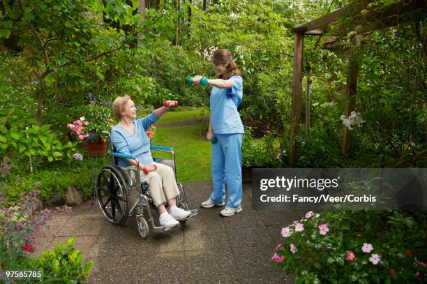 nurse and patient - showing kindness stock pictures, royalty-free photos & images