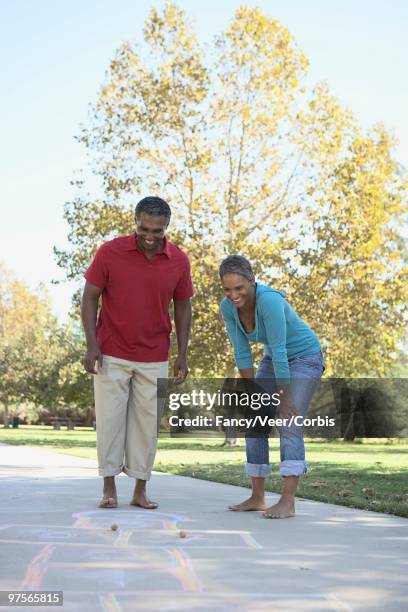 carefree couple - veer stock pictures, royalty-free photos & images