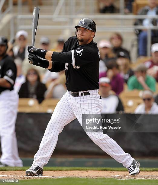 PIerzynski of the Chicago White Sox singles against the Seattle Mariners on March 8, 2010 at The Ballpark at Camelback Ranch in Glendale, Arizona.